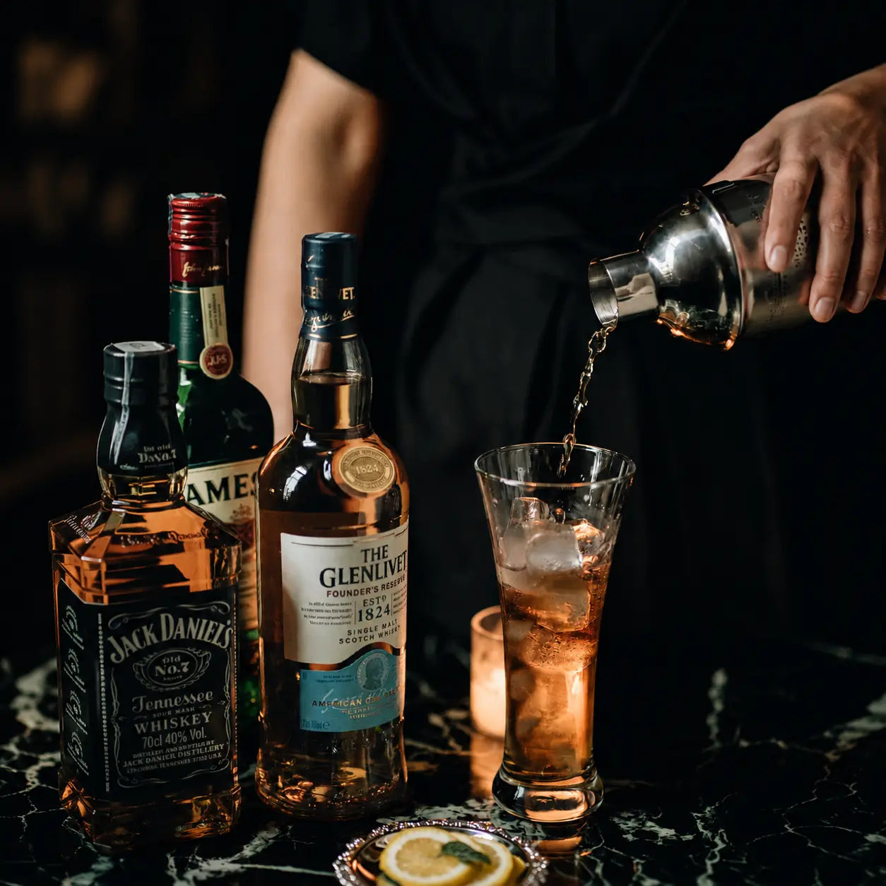 Pour a drink in a home bar scene with bottles and glassware.