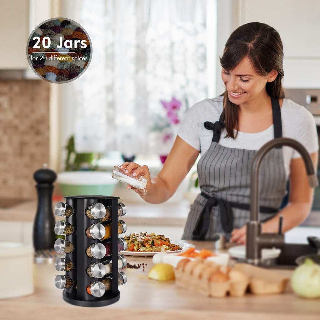 Countertop rotating spice rack used in kitchen for organized seasoning and spice storage