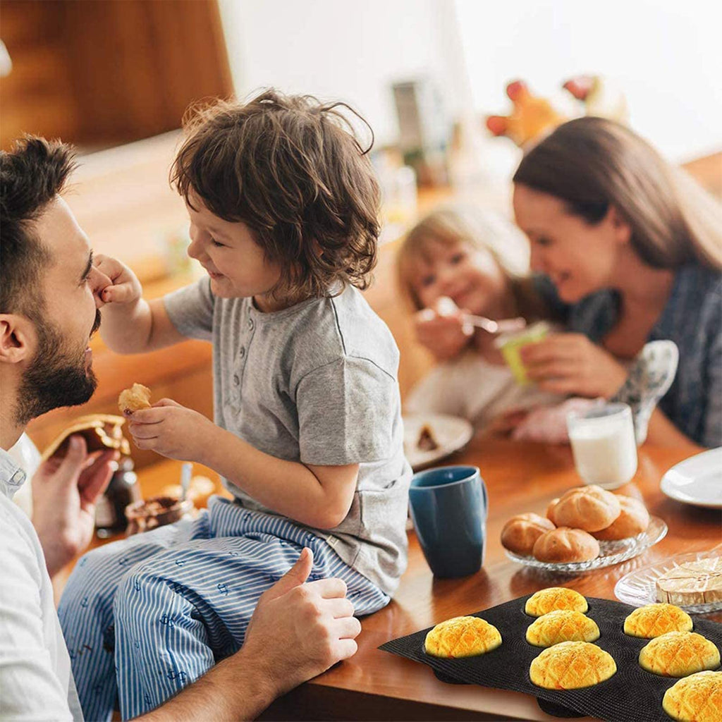Family enjoying homemade burger buns made with a silicone hamburger bun mold