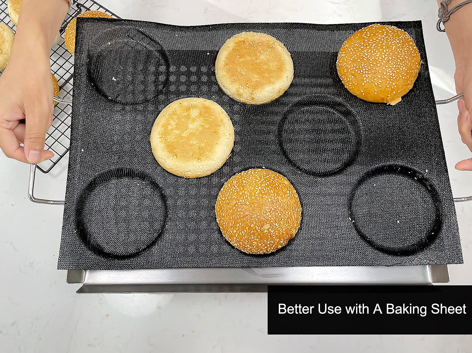 Round sesame burger buns baked in perforated silicone bun pan for even shape and texture