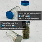 Glass spice jars with protective blue film on lids before revealing silver metal caps