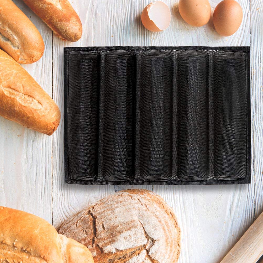 Freshly baked baguettes with golden crust made using a baguette baking tray
