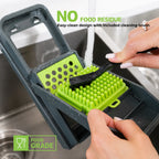 Cleaning the green press plate of the RüK vegetable chopper under running water with the dedicated cleaning brush for zero food residue, safe for dishwasher cleaning.